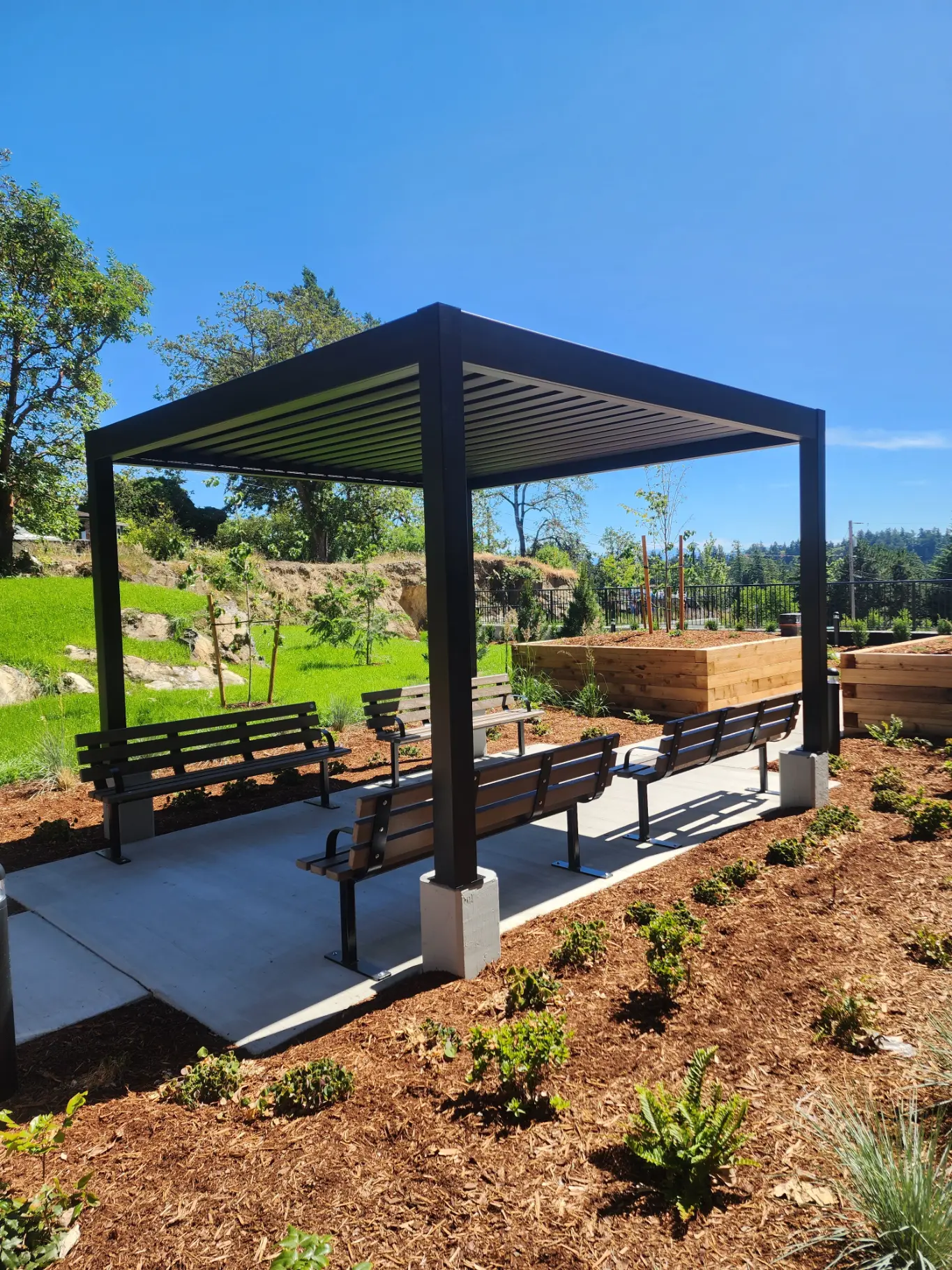 Black louvered pergola project in Cowichan Bay